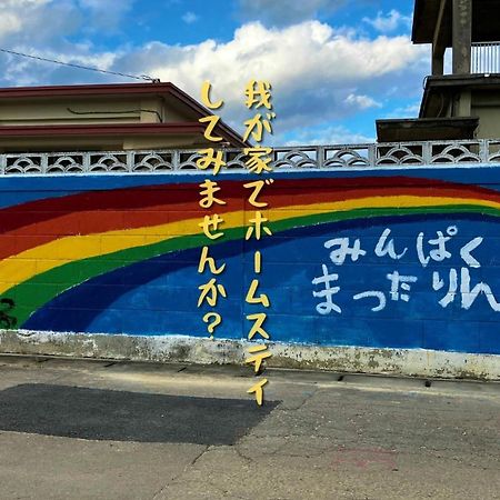 民泊まったりん人 Appartement Kumejima Buitenkant foto