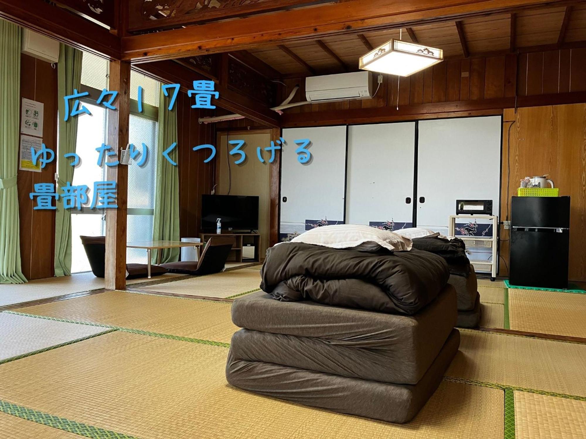 民泊まったりん人 Appartement Kumejima Buitenkant foto